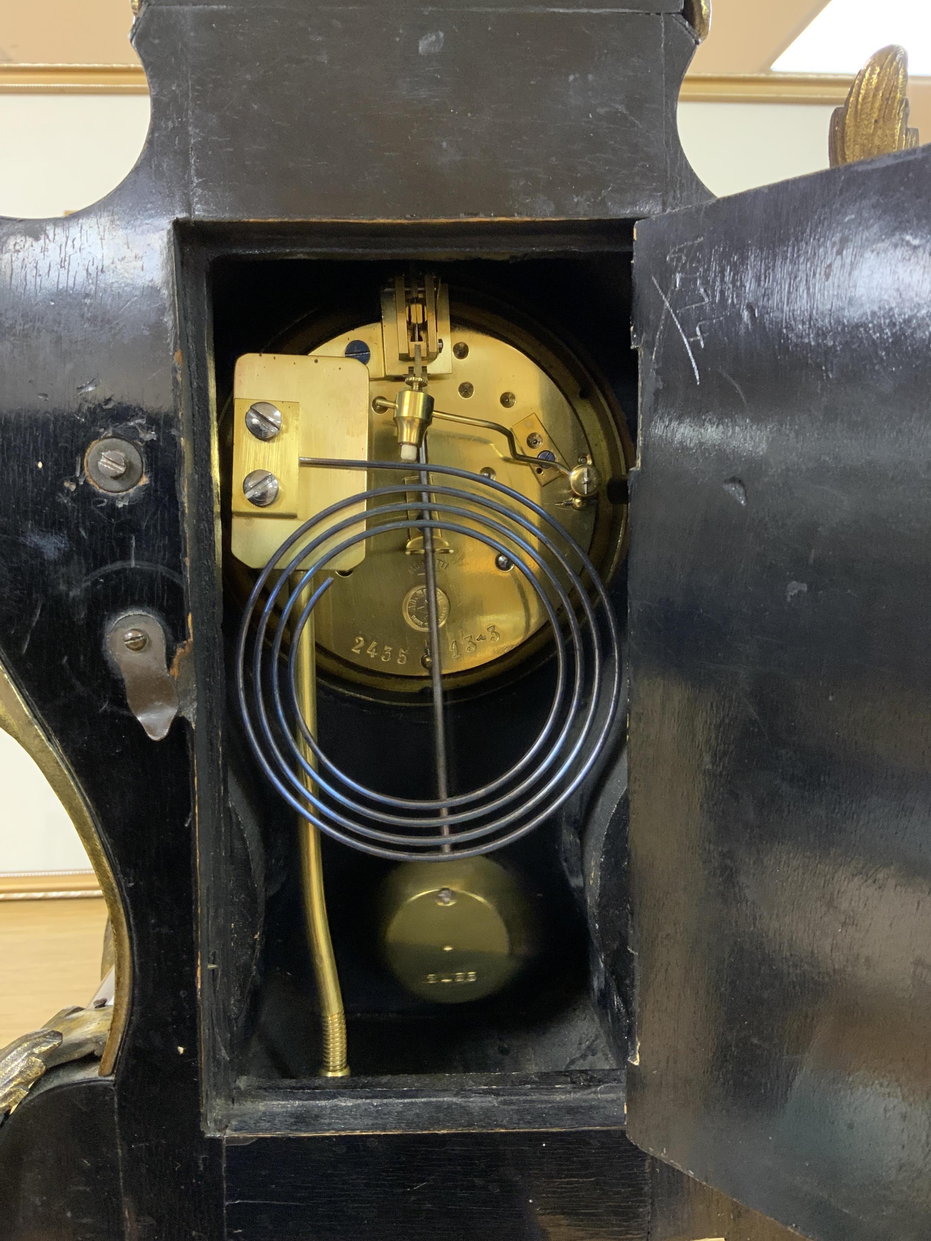 A Louis XV style tortoiseshell and ormolu-mounted mantel clock with pendulum and key, the dial inscribed Hamilton & Inches, Paris, 41cm high